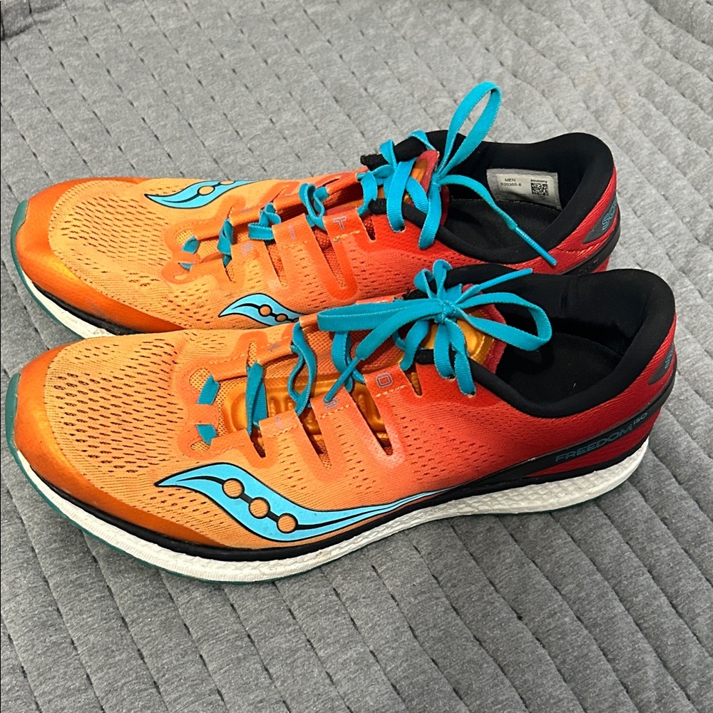 Saucony Vibrant Orange and Teal Sneakers
